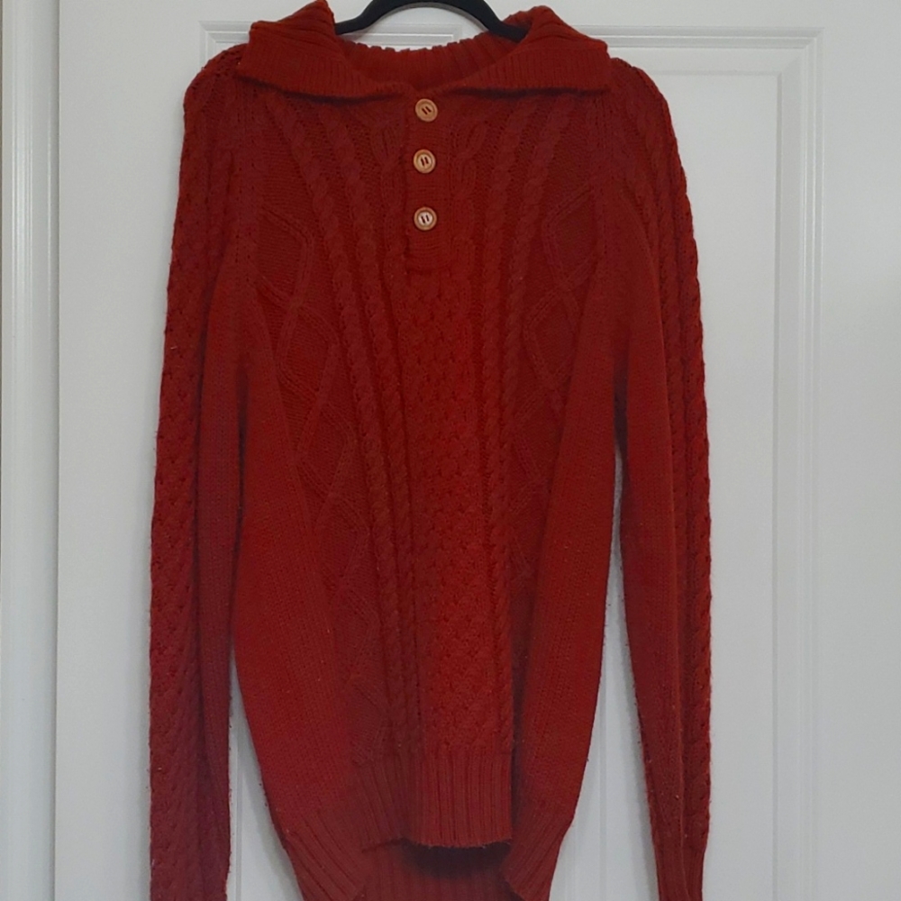 An orange sweater